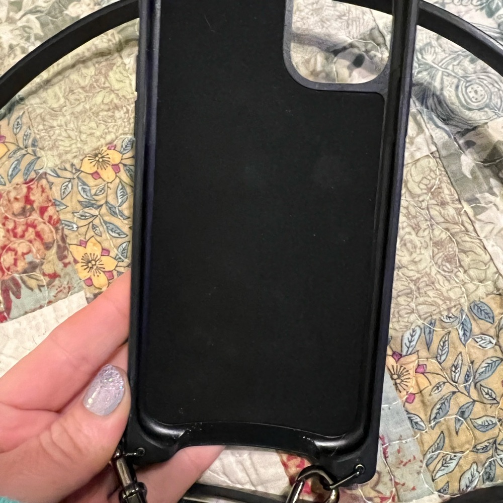 Bandolier iPhone 11 case w/ crossbody strap in like new condition.